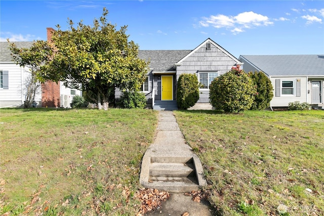 view of front of house with a front lawn