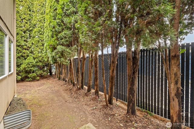 view of yard with fence