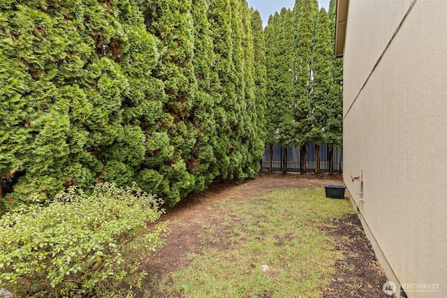 view of yard featuring fence