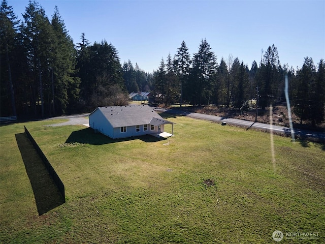 aerial view with a wooded view