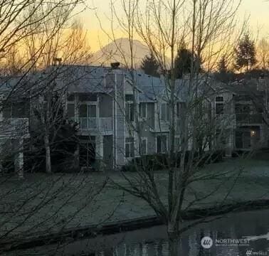 view of property exterior at dusk