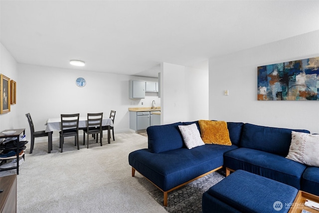 living room with baseboards and light colored carpet