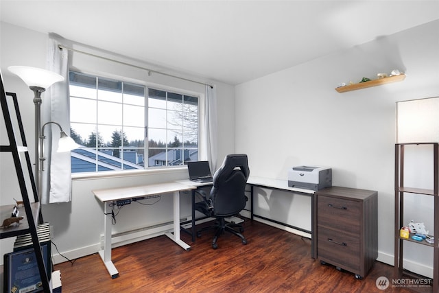 office space featuring baseboards and wood finished floors