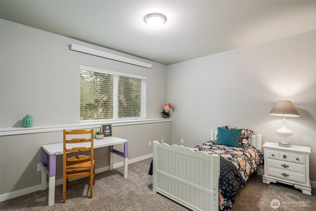 carpeted bedroom with baseboards