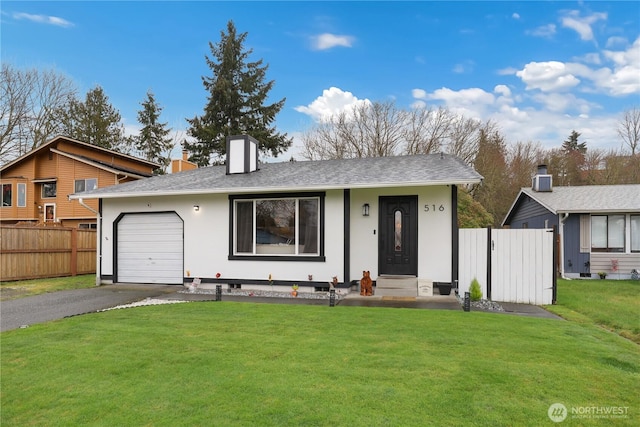 single story home with aphalt driveway, an attached garage, fence, a front lawn, and a chimney