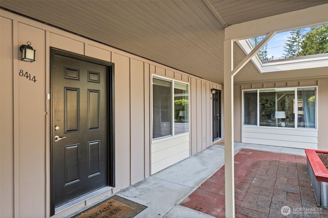 property entrance with board and batten siding