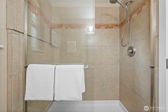 full bathroom with a shower stall