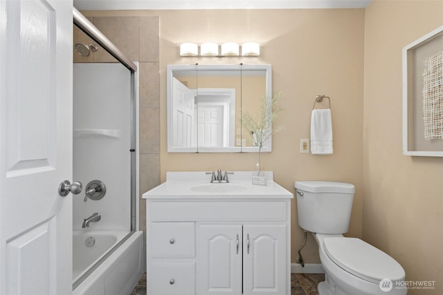 bathroom with shower / bathing tub combination, vanity, and toilet