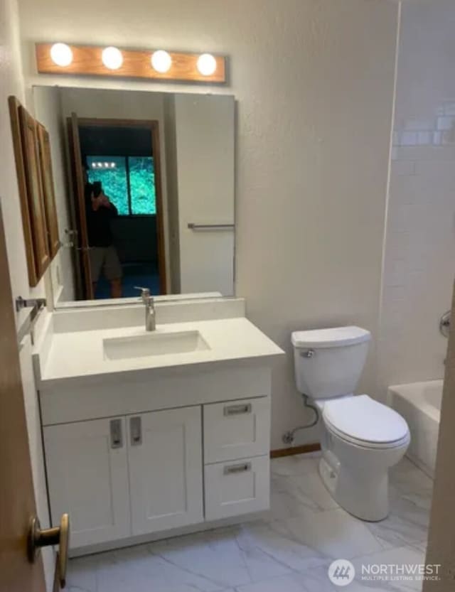 304 10th St, Kirkland, WA 98033 - full bath with vanity, toilet, and marble finish floor