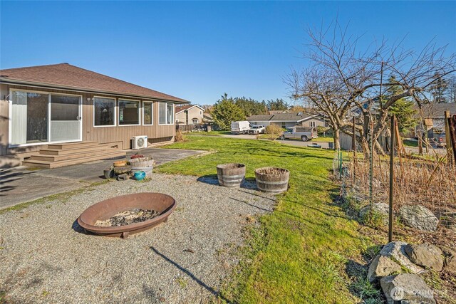 view of yard featuring a patio area and entry steps