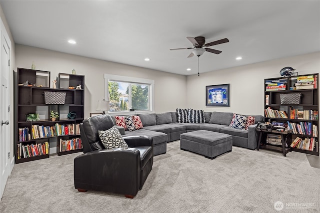 carpeted living room featuring ceiling fan and recessed lighting