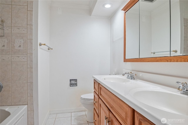 full bathroom featuring ornamental molding, a sink, baseboards, and tile patterned floors