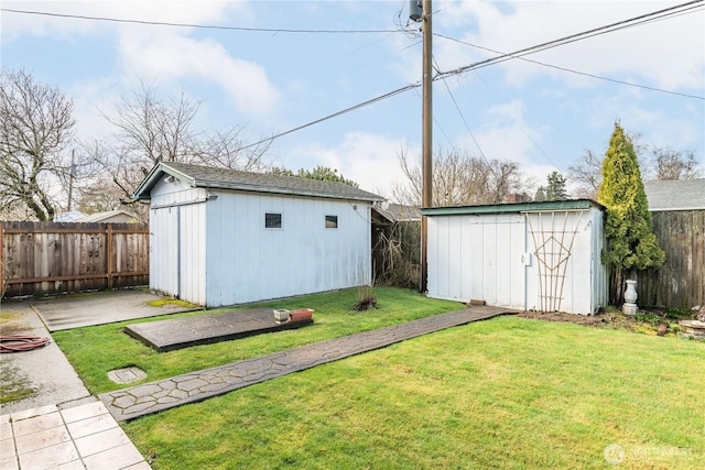 view of shed featuring a fenced backyard