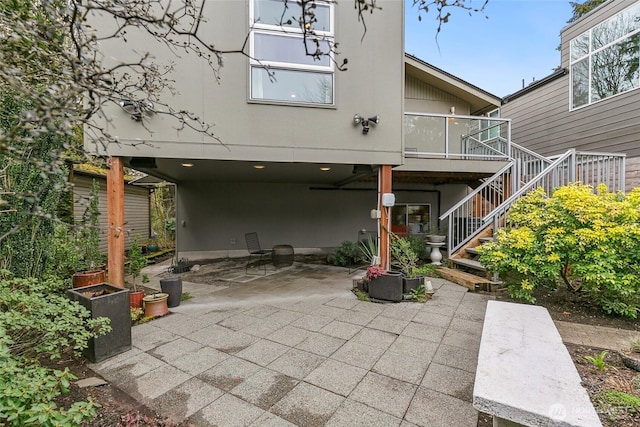 view of patio / terrace with stairway