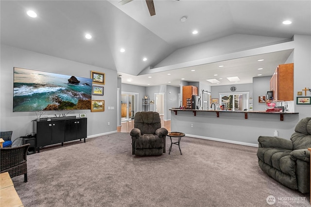 living area featuring carpet floors, recessed lighting, and lofted ceiling