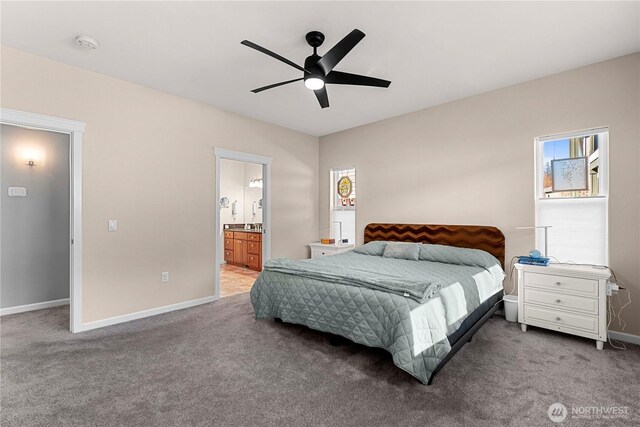 bedroom featuring a ceiling fan, carpet, connected bathroom, and baseboards