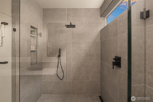 full bathroom with a shower stall