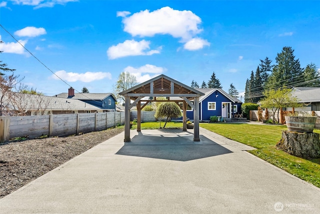 view of patio featuring a gazebo and fence