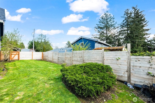 view of yard featuring a fenced backyard