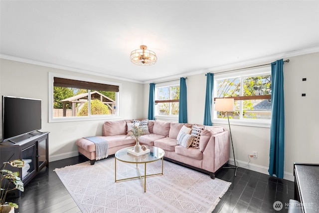 living room featuring a notable chandelier, baseboards, dark wood-type flooring, and crown molding