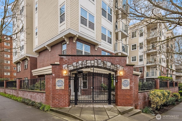 view of property with a fenced front yard