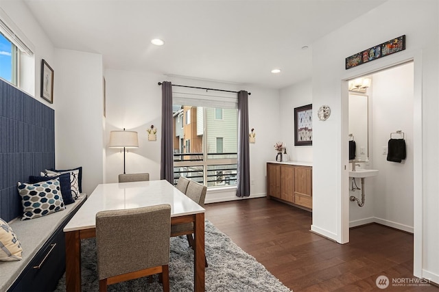 dining area with dark wood-style floors, recessed lighting, and baseboards