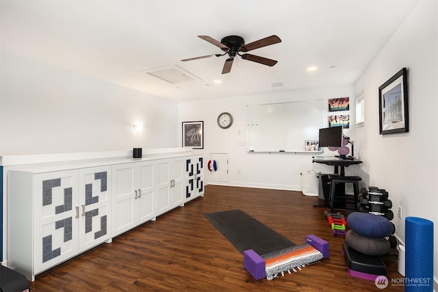 workout room featuring dark wood-style floors, baseboards, attic access, and recessed lighting