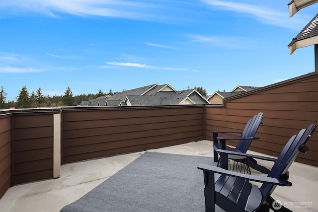 view of patio / terrace with a balcony