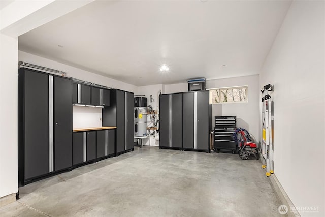 garage featuring water heater