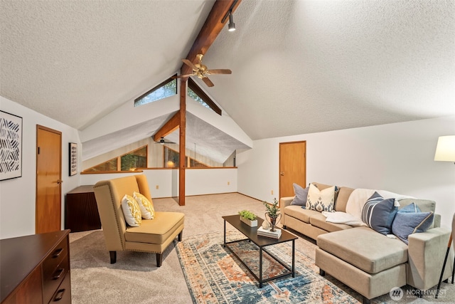 living room featuring a ceiling fan, light colored carpet, vaulted ceiling with beams, and a textured ceiling