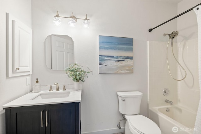 bathroom featuring shower / bath combination, vanity, and toilet