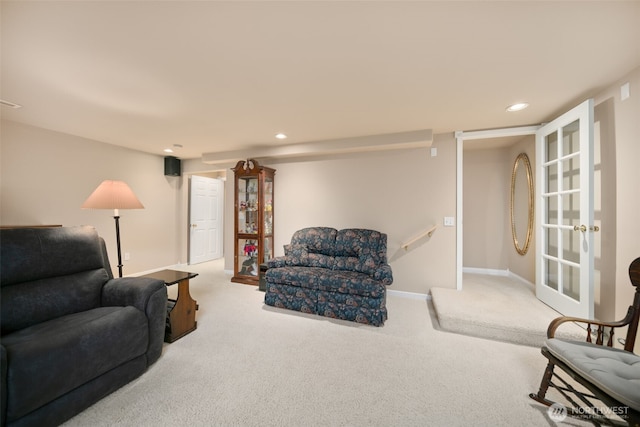 living area with baseboards, carpet flooring, and recessed lighting