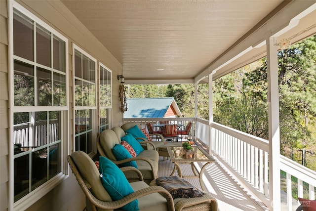 balcony featuring covered porch