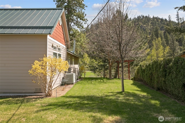 view of yard with central AC