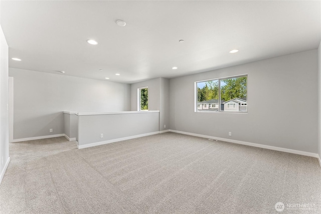 13915 179th St E Unit 58, Puyallup, WA 98374 - unfurnished room featuring recessed lighting, light carpet, and baseboards