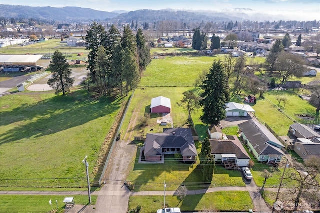 birds eye view of property with a residential view and a mountain view