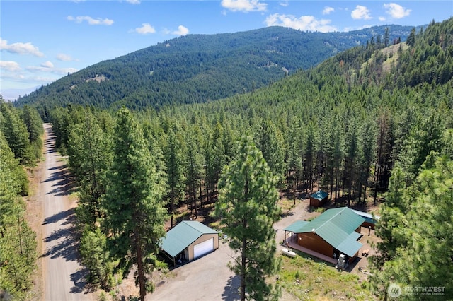 bird's eye view featuring a mountain view and a forest view