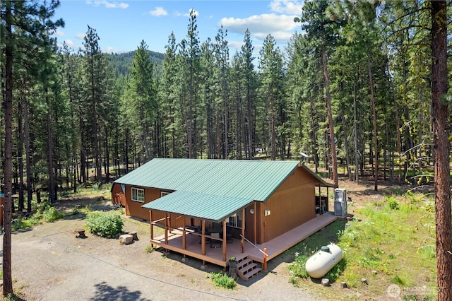 aerial view featuring a forest view