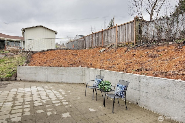 view of patio with fence