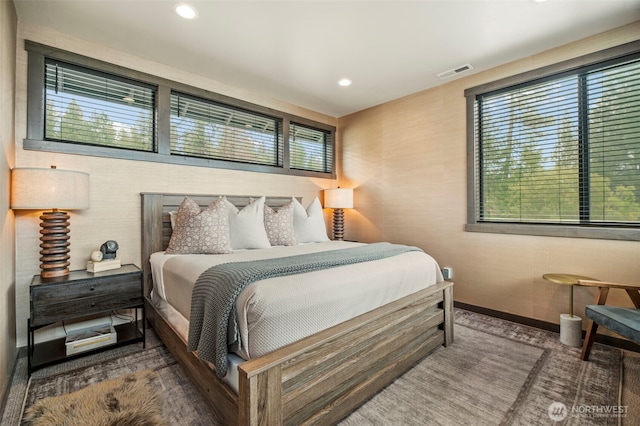 bedroom with baseboards, visible vents, and recessed lighting