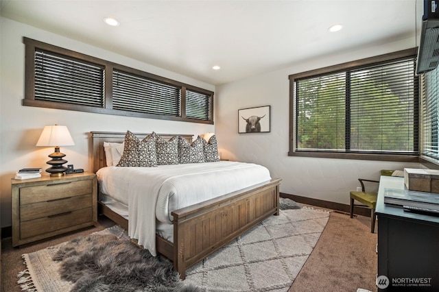 bedroom featuring baseboards and recessed lighting