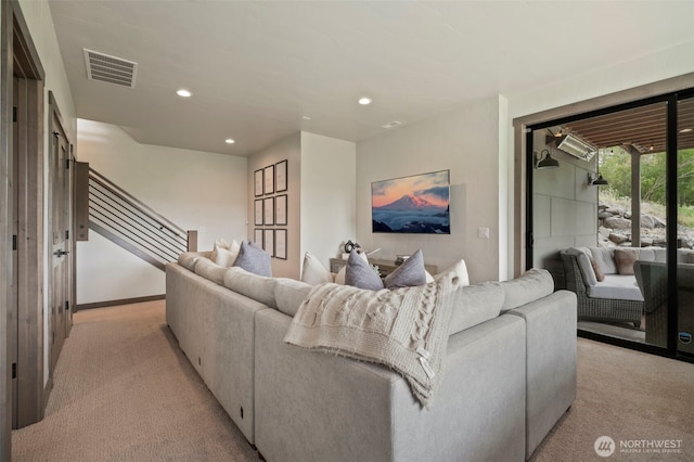 living room with recessed lighting, visible vents, stairway, light carpet, and baseboards