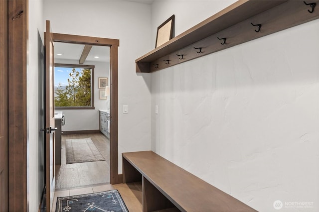 mudroom featuring light tile patterned floors