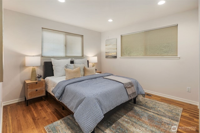 bedroom with recessed lighting, baseboards, and wood finished floors