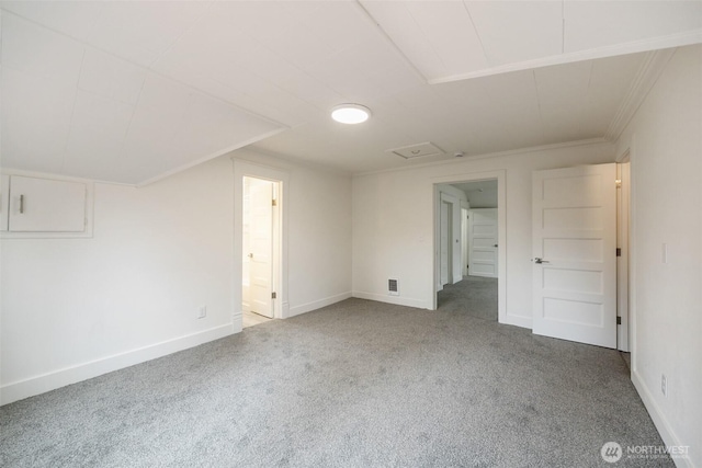 interior space with crown molding, visible vents, baseboards, and carpet floors