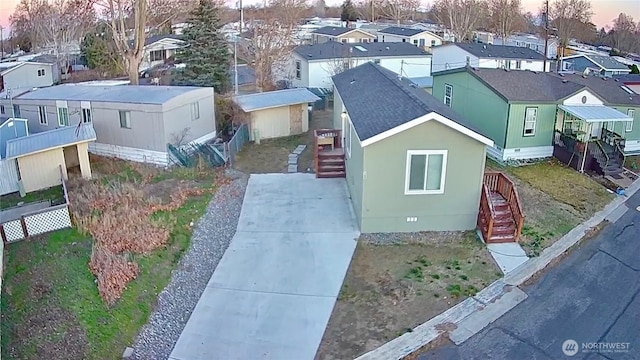 aerial view at dusk with a residential view