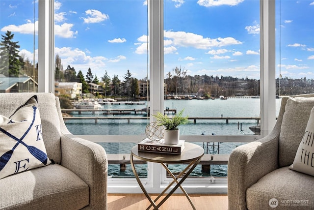 balcony featuring a water view