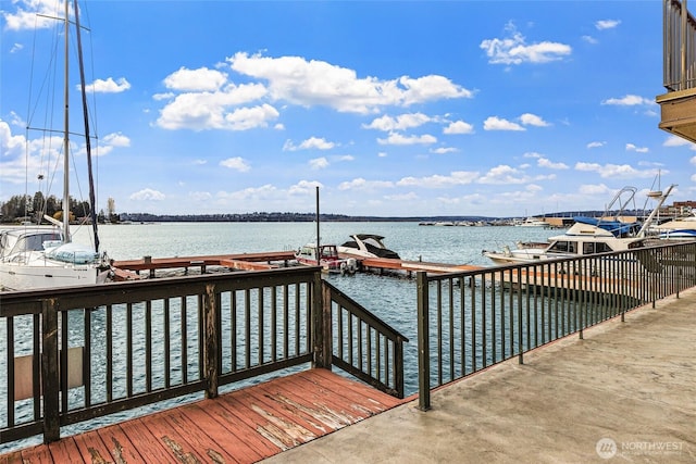 view of dock with a water view