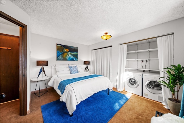 carpeted bedroom with baseboards, washer and clothes dryer, and a textured ceiling