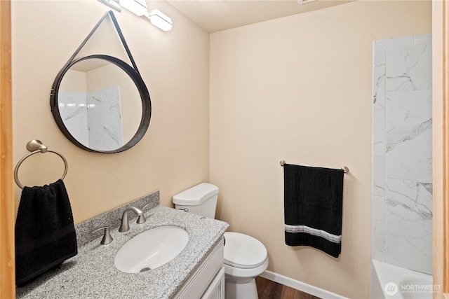 bathroom featuring toilet, vanity, wood finished floors, walk in shower, and a bath